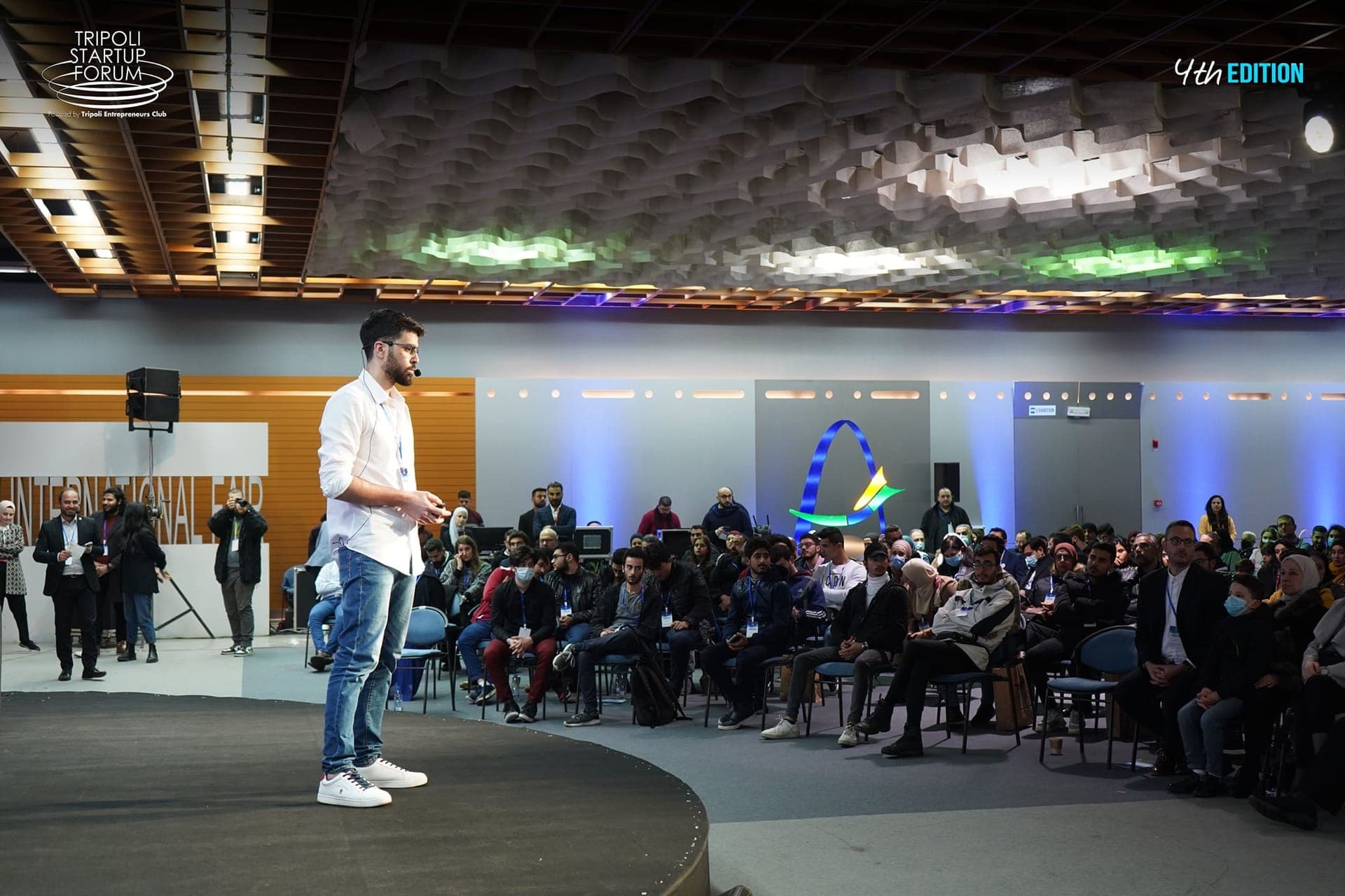 Founder pitching on stage to a Jadwa06 audience