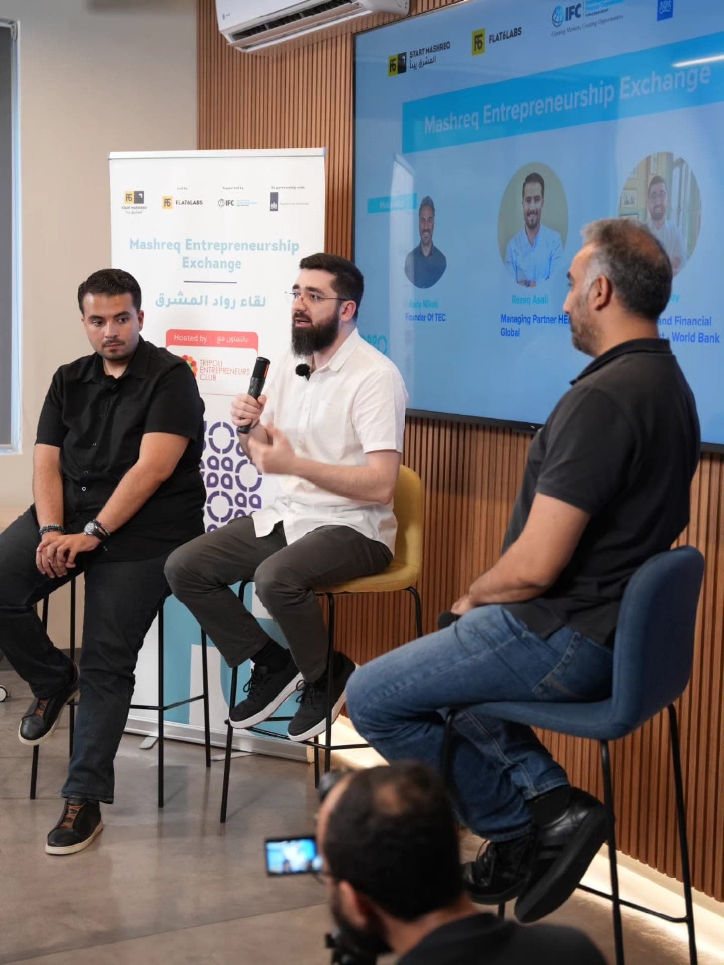 Founders speaking on a panel at a Jadwa06 event