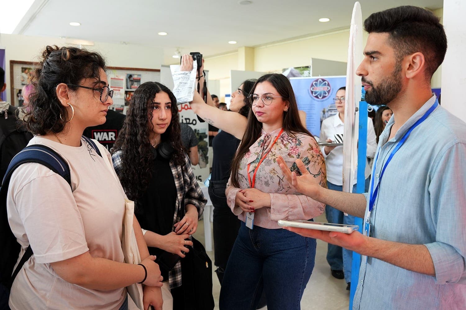 Youngpreneurs Academy participants building a project during a workshop